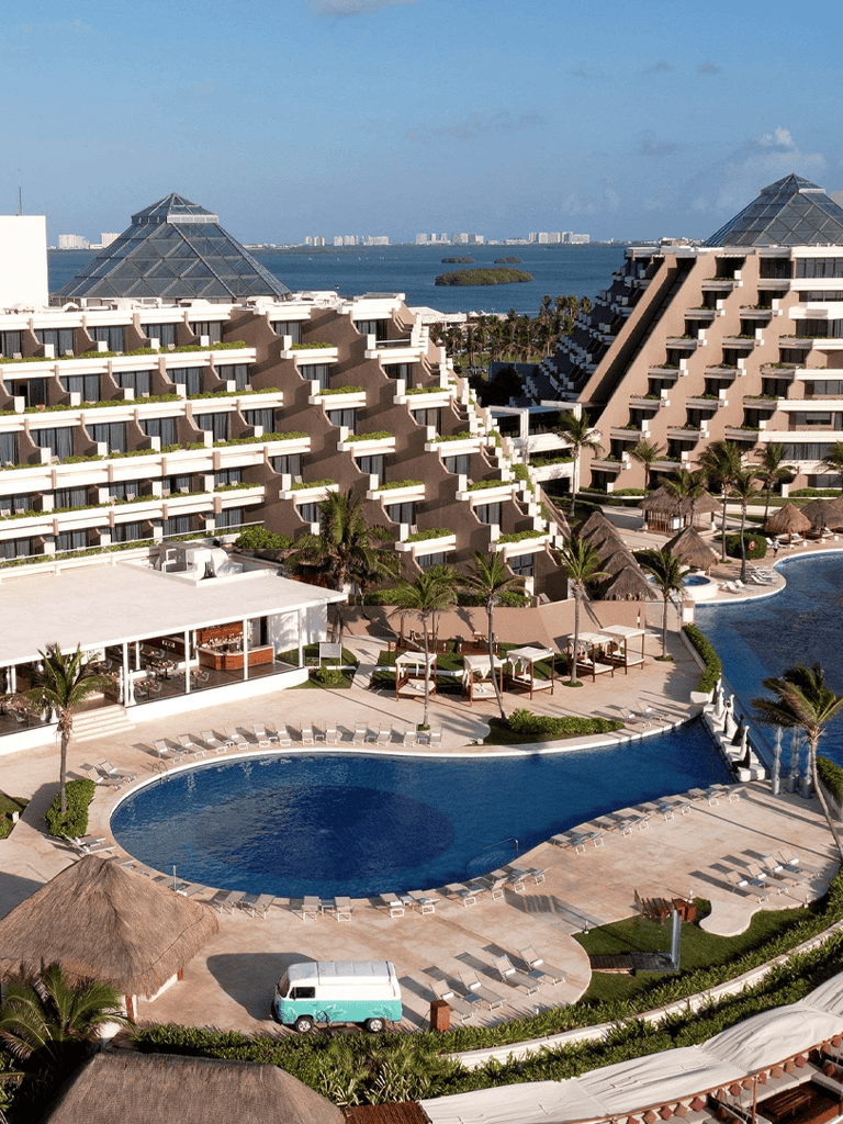 Luxurious beachfront resort with modern architecture and infinity pool in Miami.