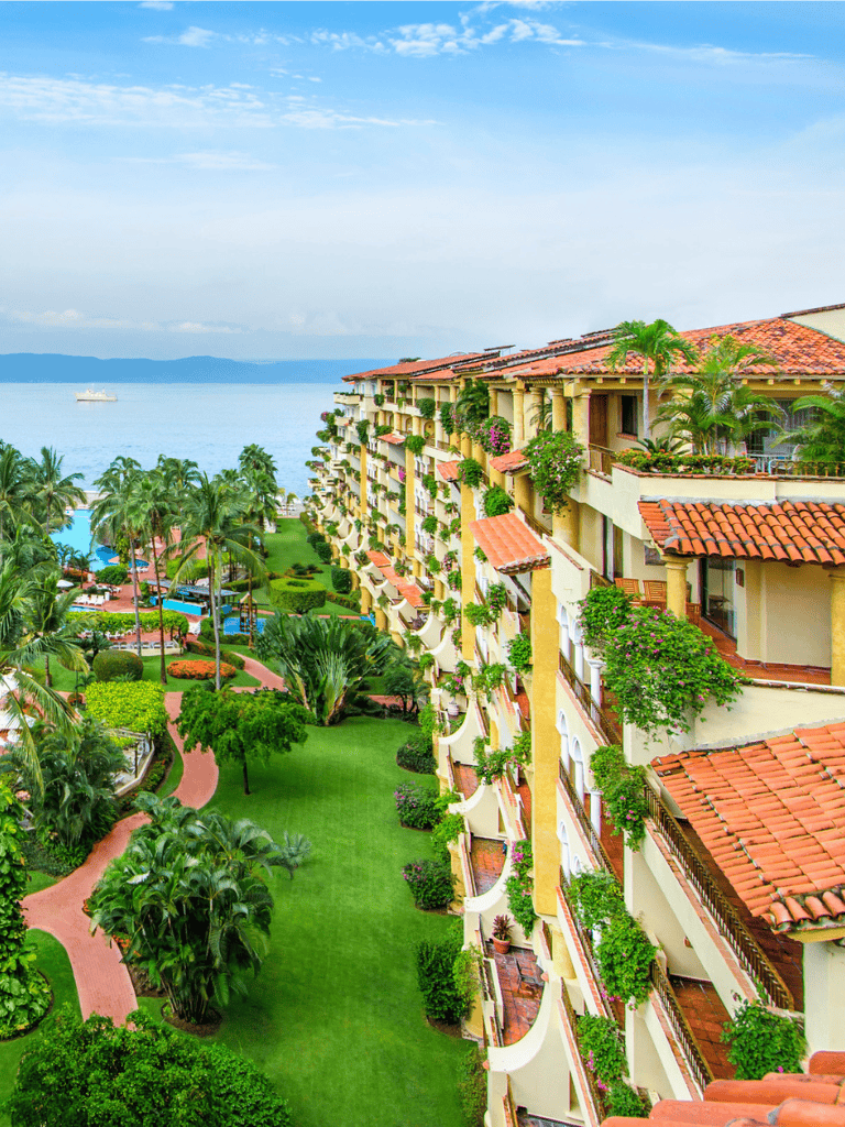 Luxurious seaside resort with lush gardens and ocean view in QuestForDirections.