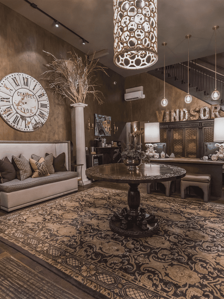 Elegant hotel lobby with classic decor and sophisticated lighting, perfect for a luxury experience.