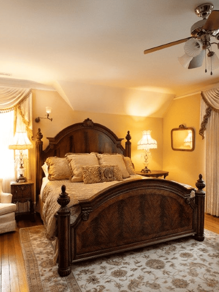 Elegant vintage bedroom with antique wooden bed, bedside lamps, and cozy decor.