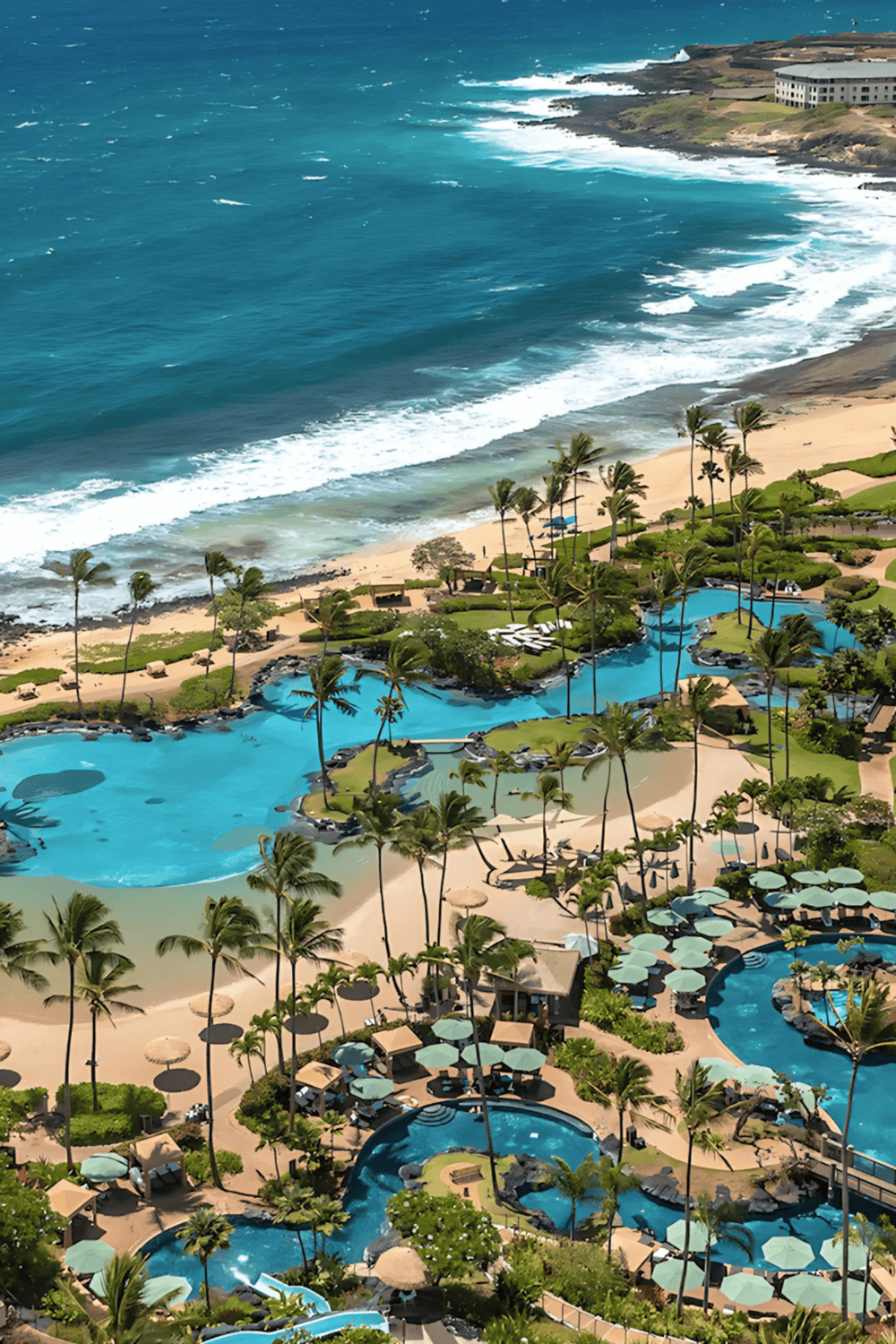 Relaxing beach resort with ocean view and lush pool area, perfect for tropical vacation getaways.