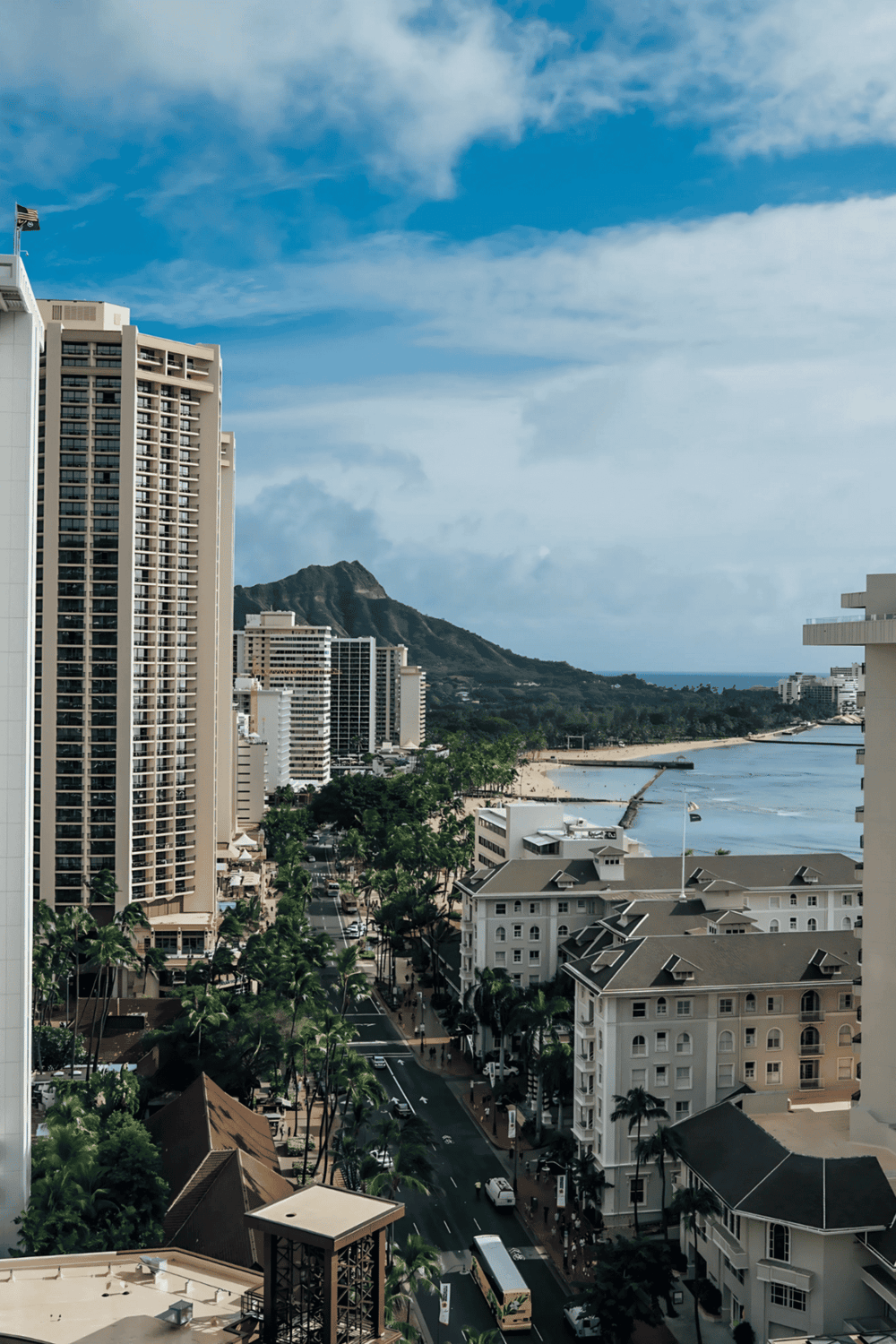 Vibrant Honolulu cityscape with Waikiki Beach and Diamond Head in background, tropical urban paradise with skyscrapers and ocean views.