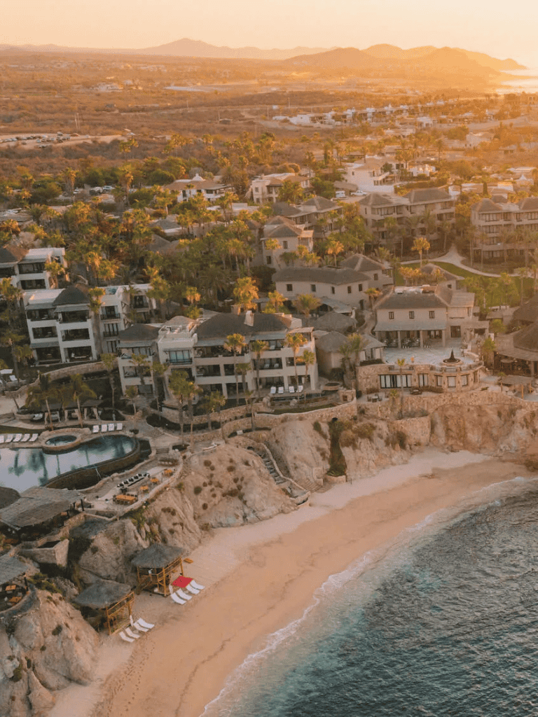 Luxurious beachfront resort with ocean views and stunning sunset scenery.