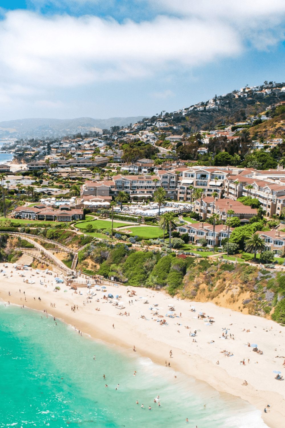 Aerial view of luxurious coastal homes and scenic beachside in San Diego, California.