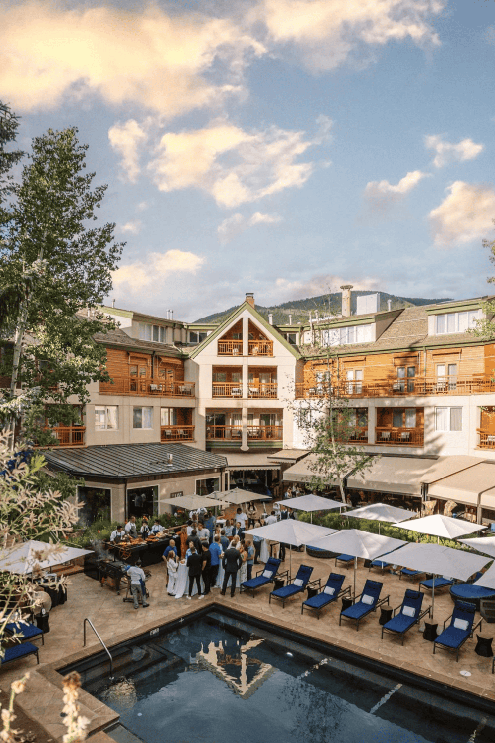 Comfortable mountain resort with outdoor pool, dining, and scenic views for a relaxing vacation.