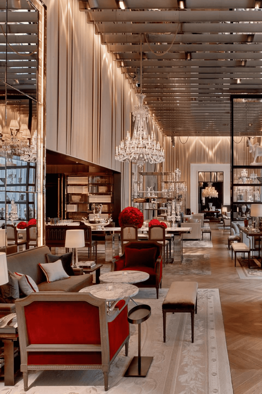 Elegant luxury hotel lobby with chandeliers and plush seating, perfect for a refined travel experience.