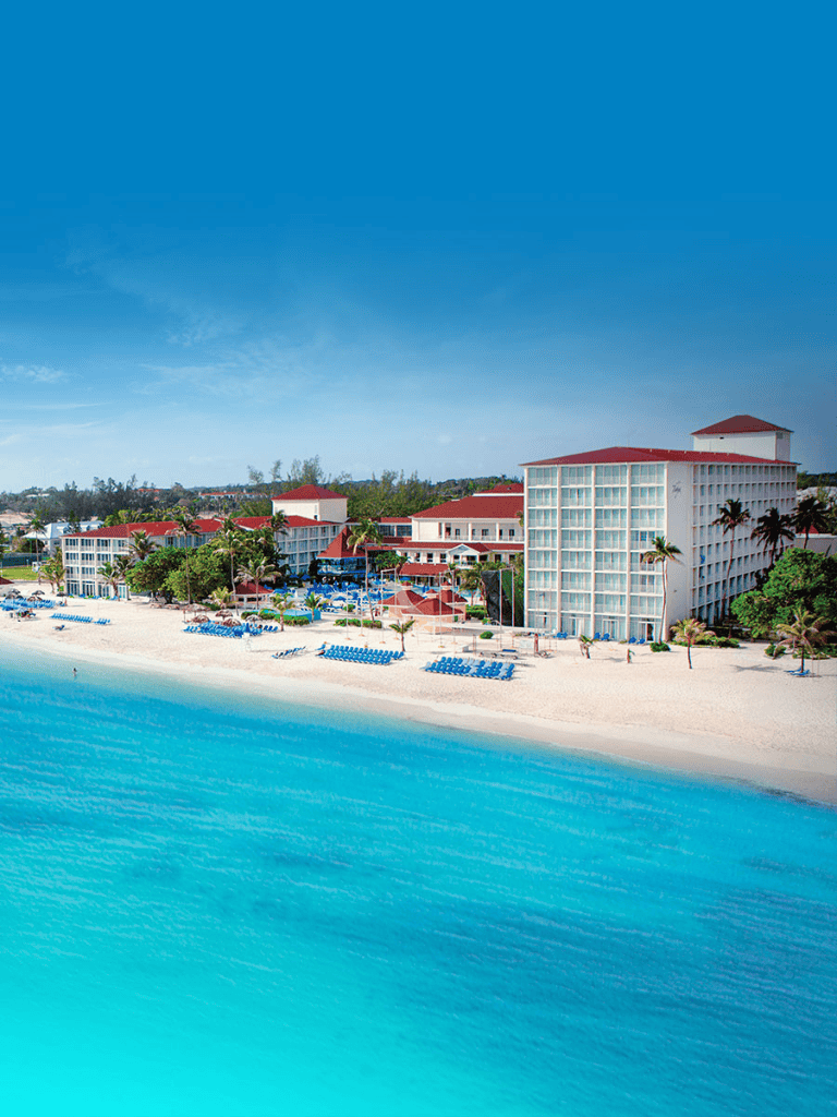 Luxury beachfront resort with ocean views and tropical surroundings.