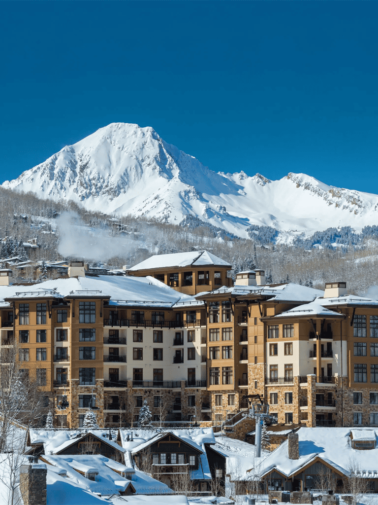 Snowy mountain resort with ski lifts and cozy chalets in a winter landscape, perfect for skiing vacations.