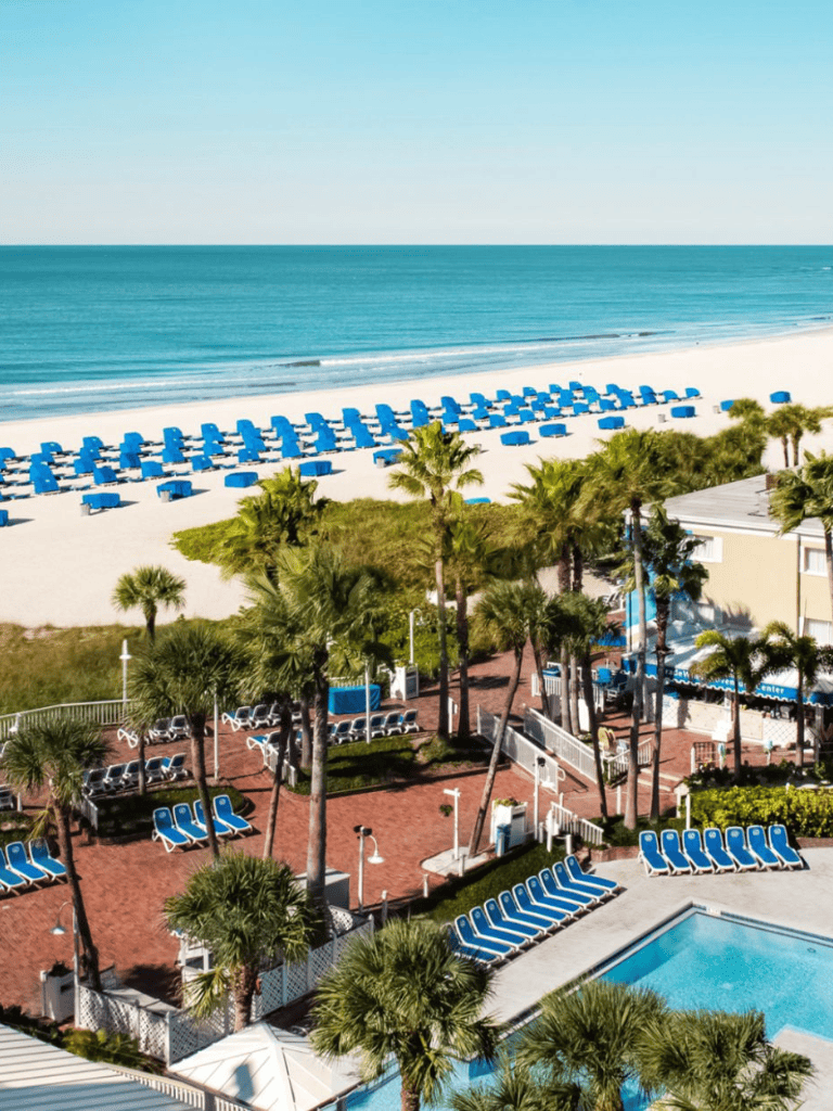 Relaxing beach resort with ocean views and tropical landscaping for ideal vacation getaways.