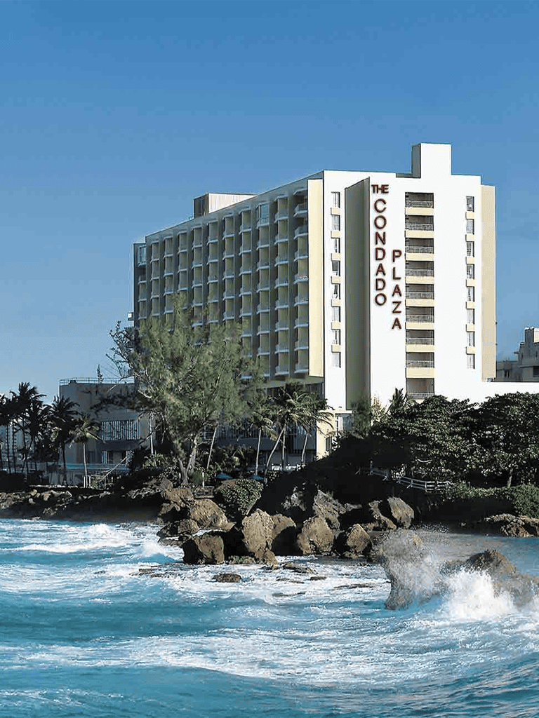 Luxury beachfront hotel on the coast with ocean views.