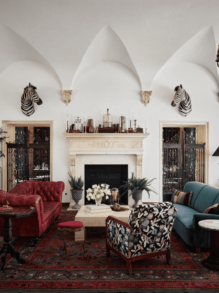 Luxurious living room with zebra wall mounts and elegant décor - QuestForDirections.