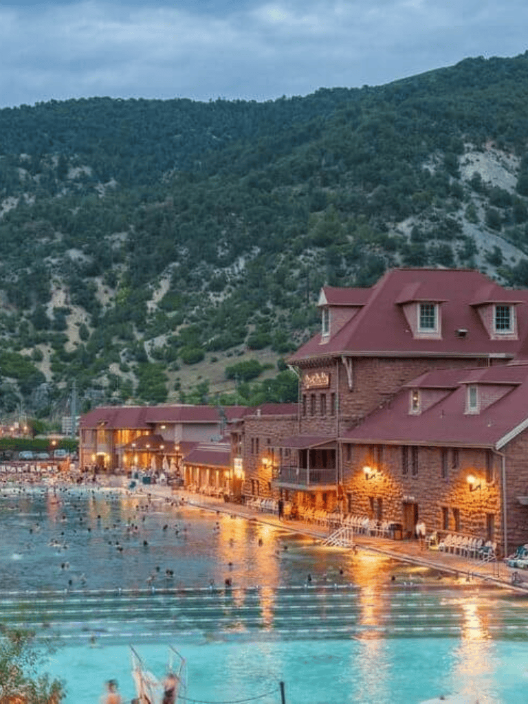 Bright mountain resort with indoor mineral pools and scenic mountain views.