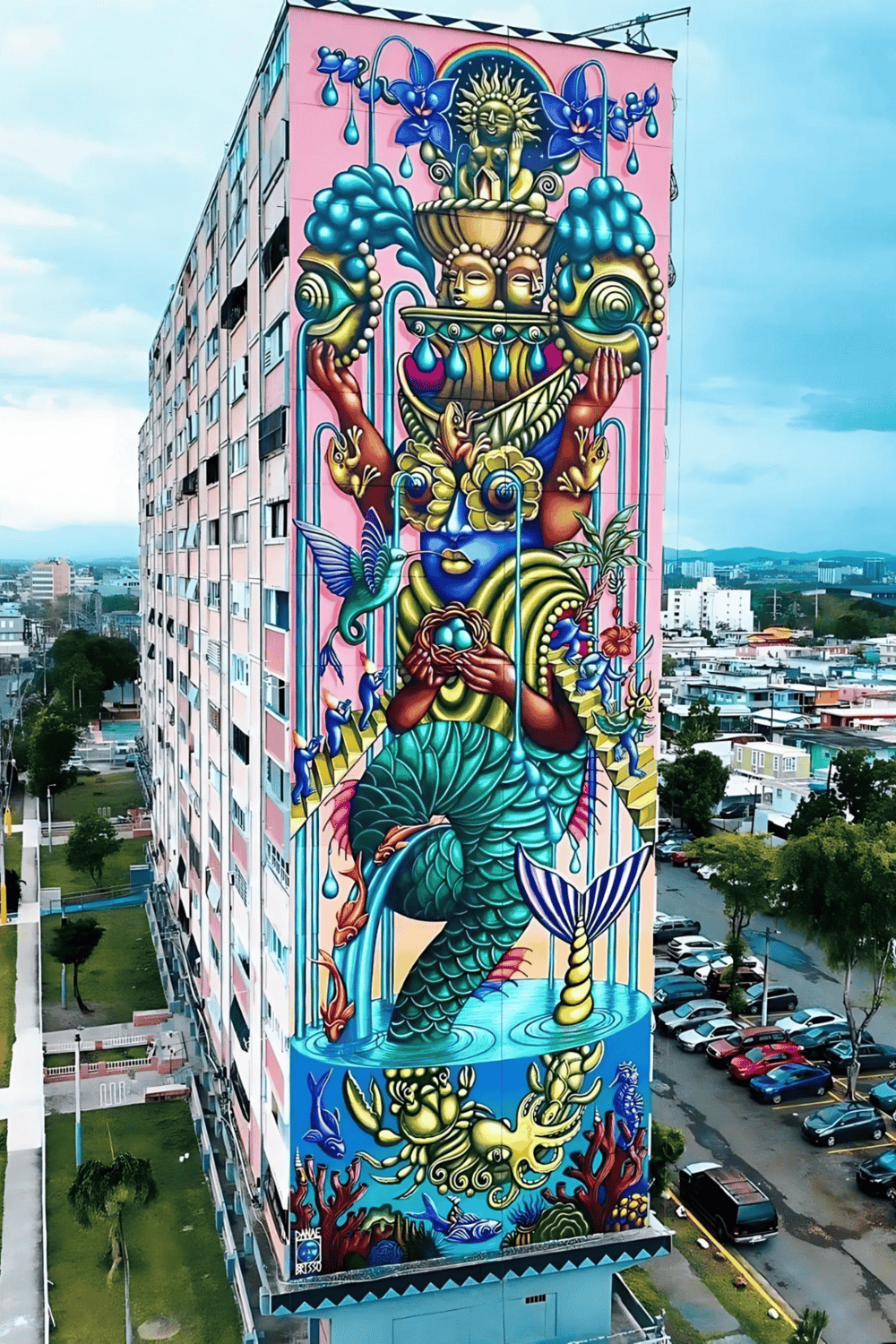 Vibrant mural on building highlighting Quest For Directions street art and urban culture.