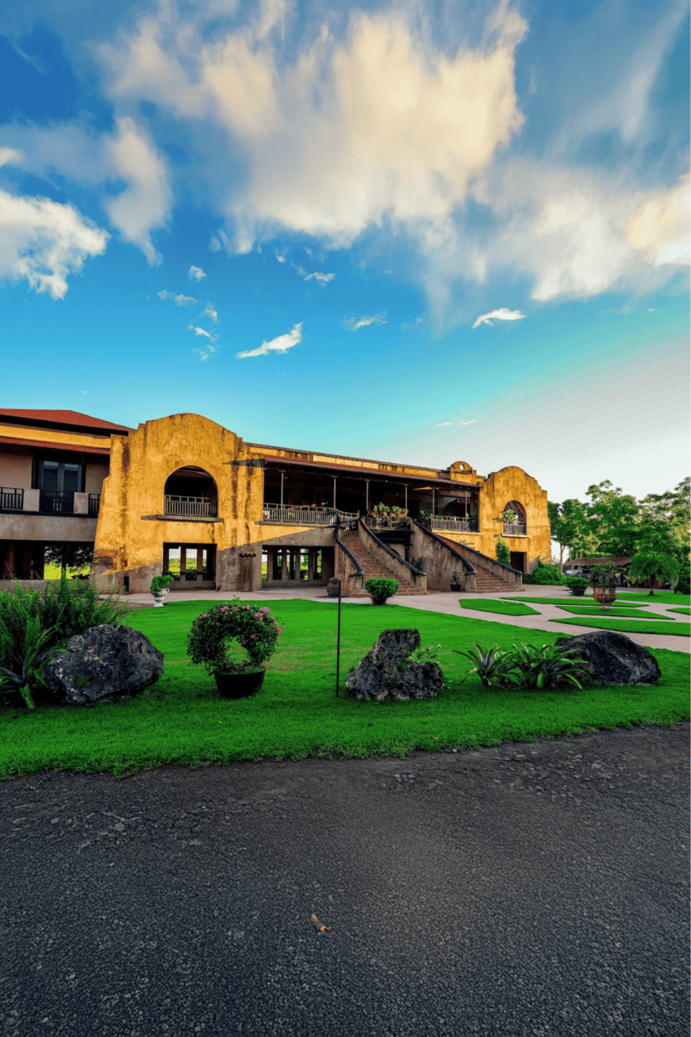 Relaxing outdoor architecture with lush greenery and vibrant sky, perfect for guiding your journey.