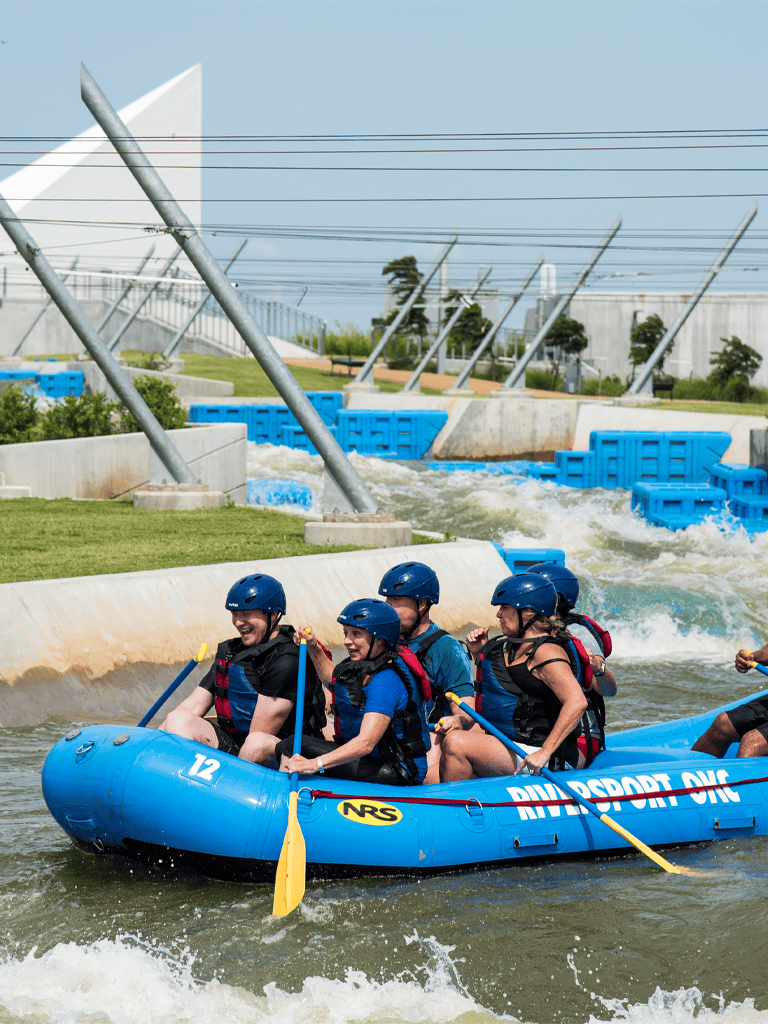 Thrilling white water rafting adventure at QuestForDirections, outdoor team building, water sports, fun group activities, Texas.