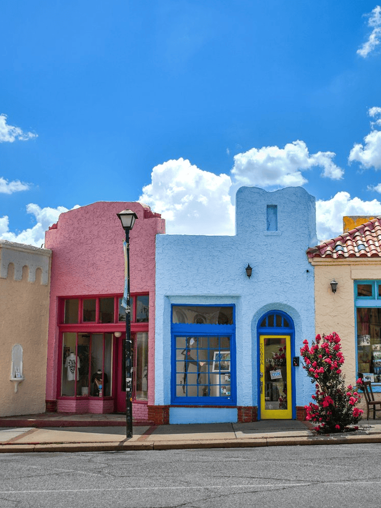 Bright colorful buildings with unique architecture in Santa Fe, New Mexico, showcasing vibrant local culture.