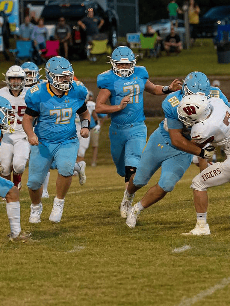Youth football players competing in a game with intense action and team spirit.