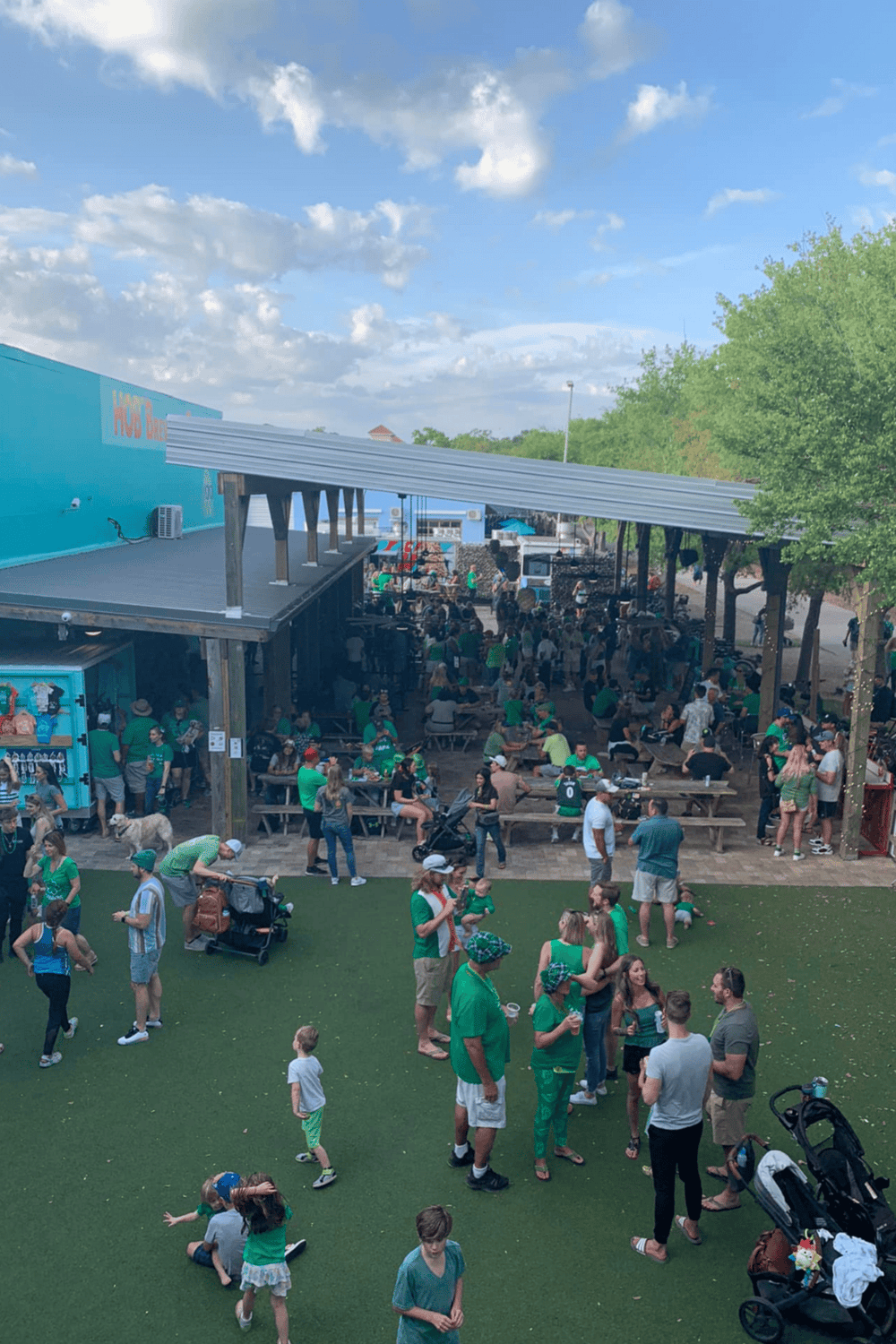 Crowd gathering at Quest for Directions outdoor event - family-friendly entertainment and activities.