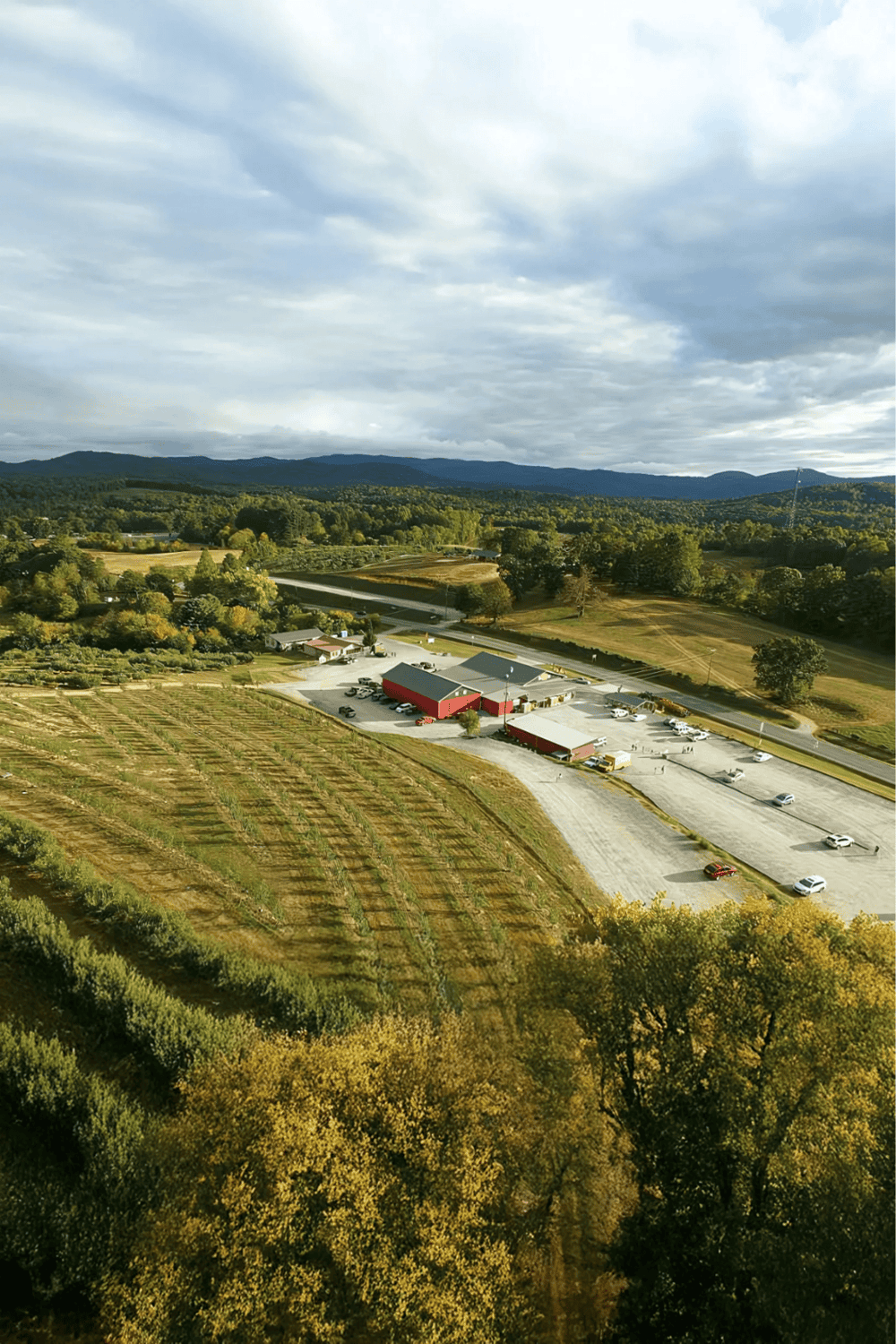 Farm and rural business location in scenic countryside for outdoor exploration and agricultural tours.