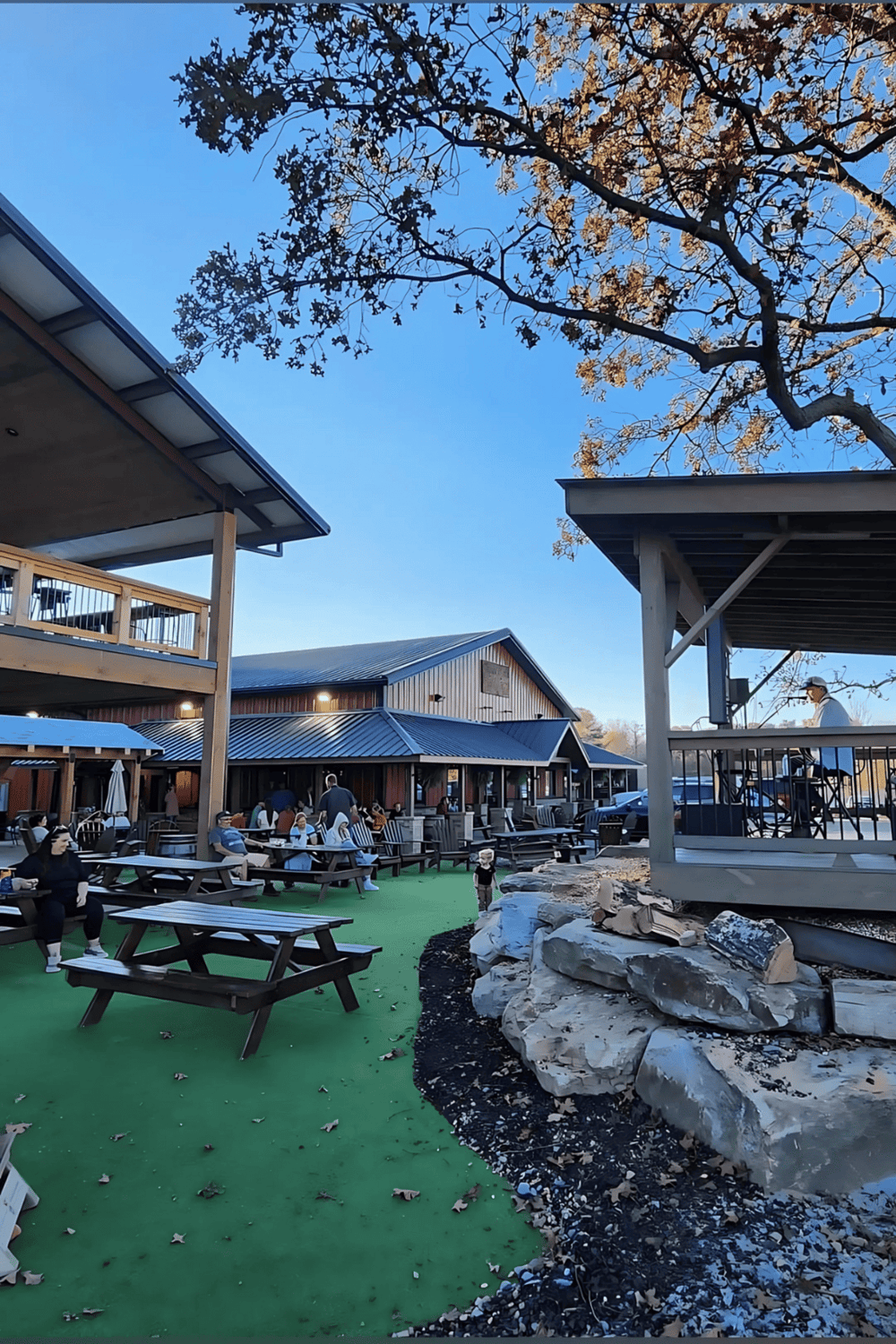 Relaxed outdoor dining at QuestForDirections restaurant with patio seating and scenic views.