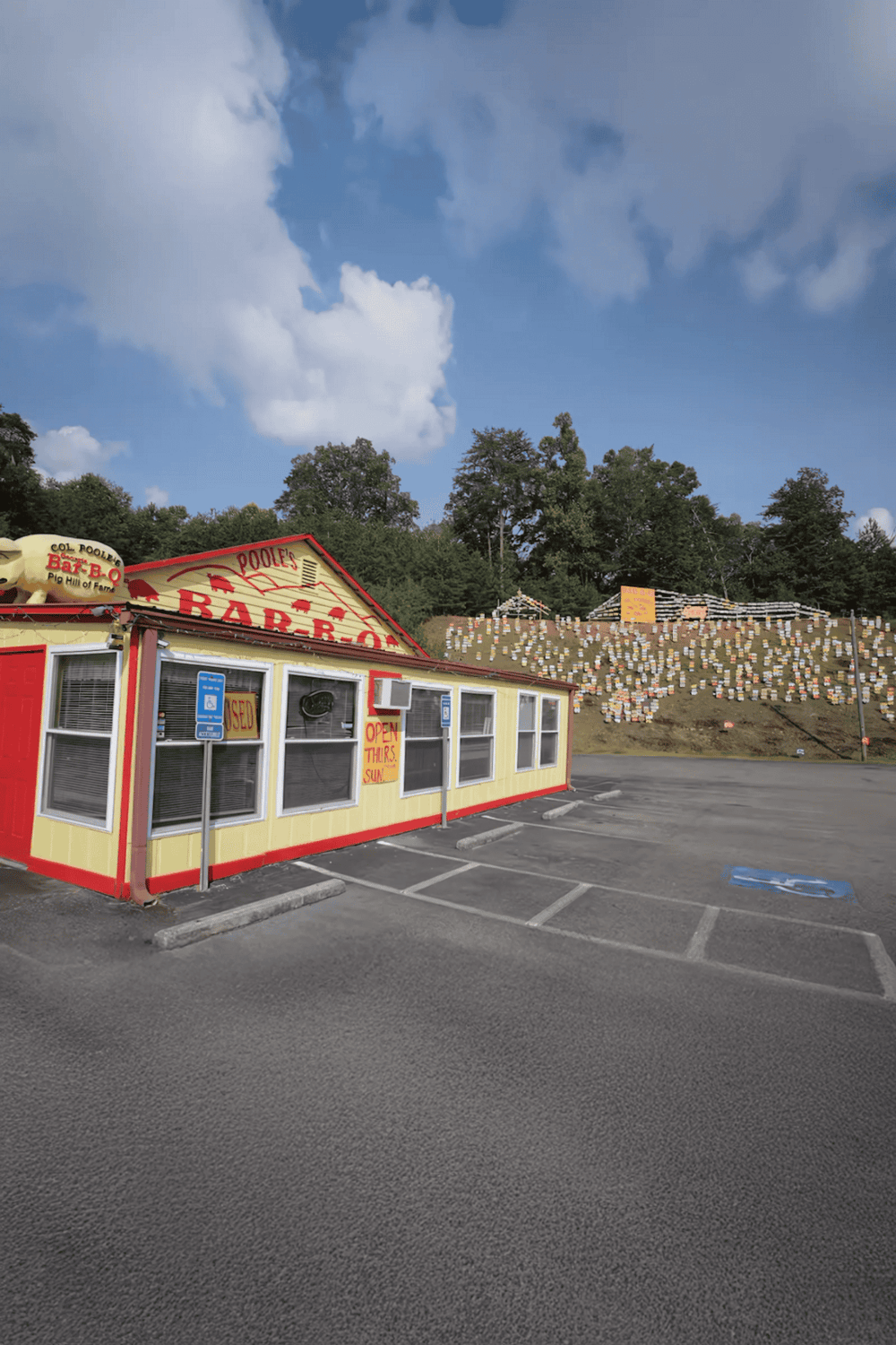 1. Vintage barbecue restaurant with colorful exterior and parking lot.