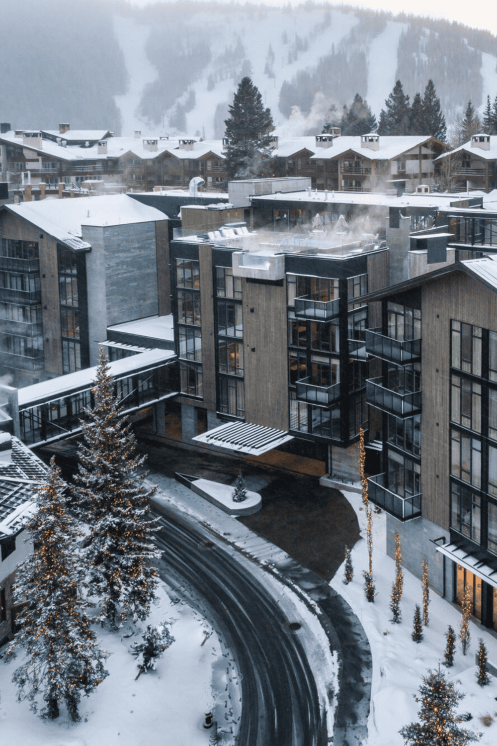 Luxurious ski resort in a snowy mountain setting with modern accommodations and scenic winter views.