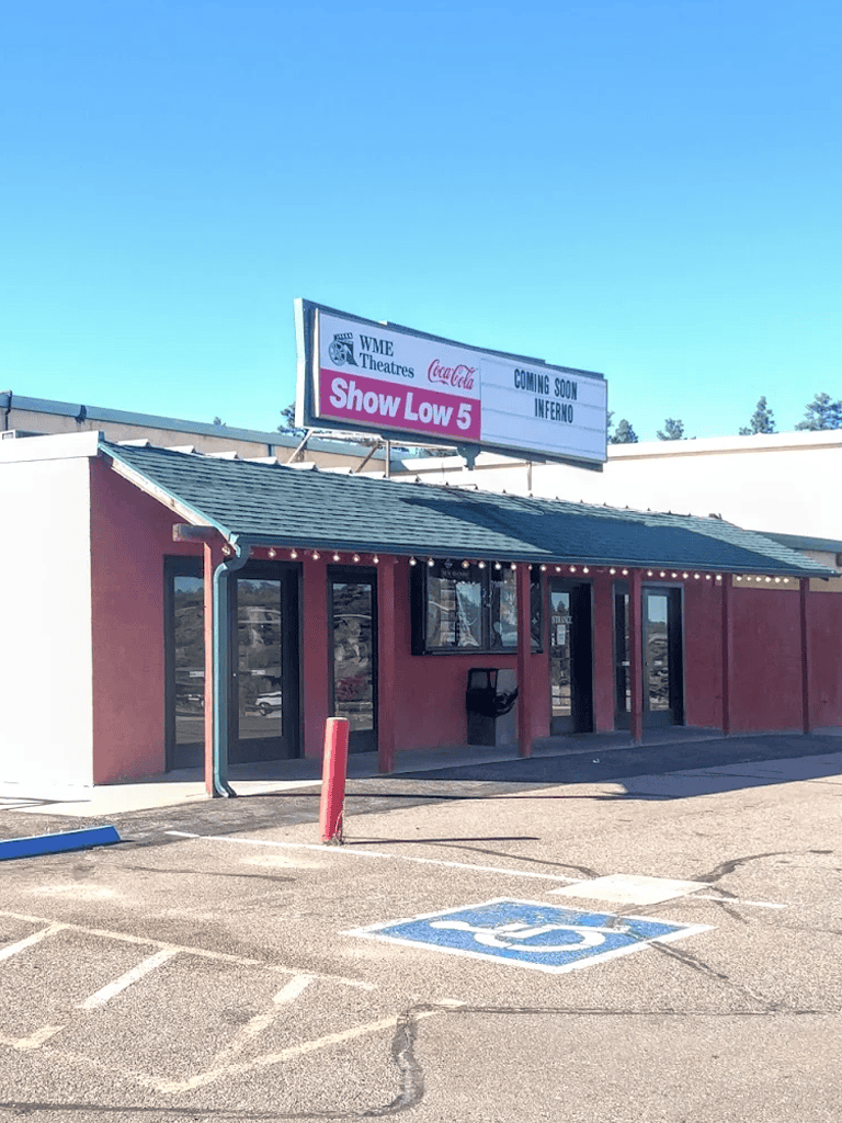 Accessible parking lot outside QuestForDirections theater building.