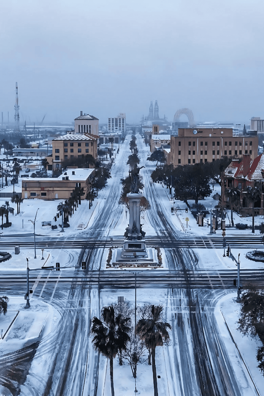 Snow-covered cityscape with iconic landmarks and city streets, featuring QuestForDirections branding for navigation solutions.