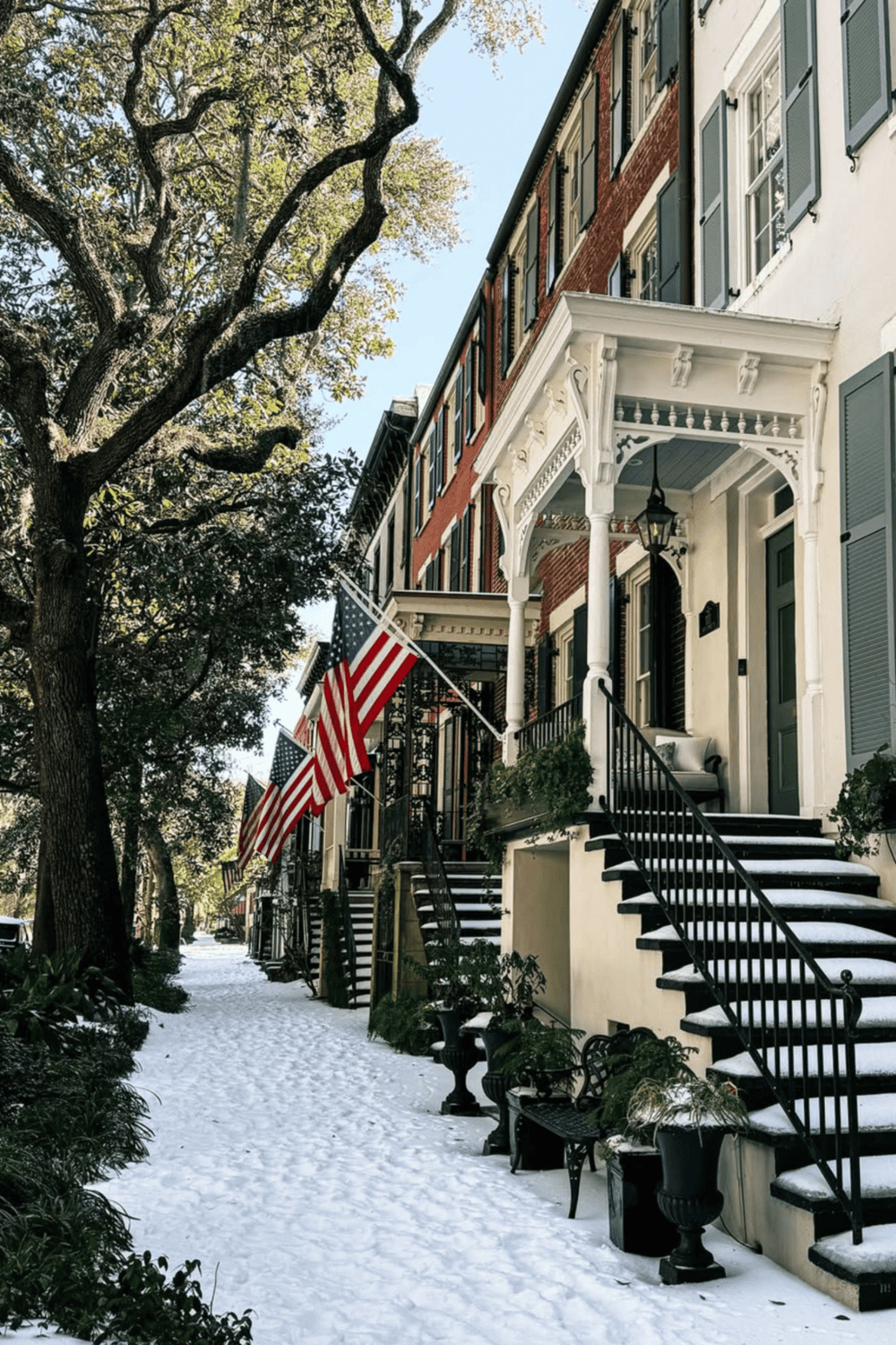 Aesthetic row of classic American townhouses during winter with American flags on porches and snow-covered sidewalk, charming neighborhood.