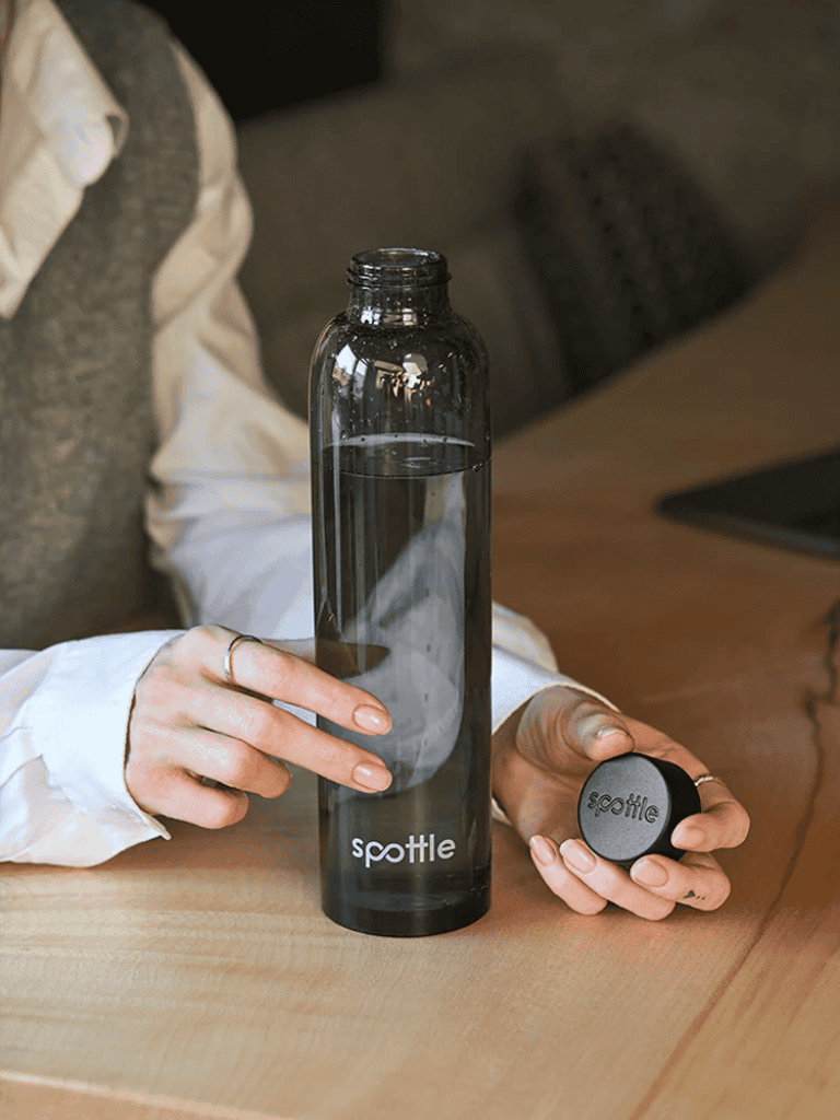 1. reusable water bottle with "spottle" logo, eco-friendly hydration, travel water container.