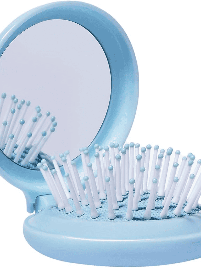 Blue compact mirror with cotton swabs inside, minimalist design.
