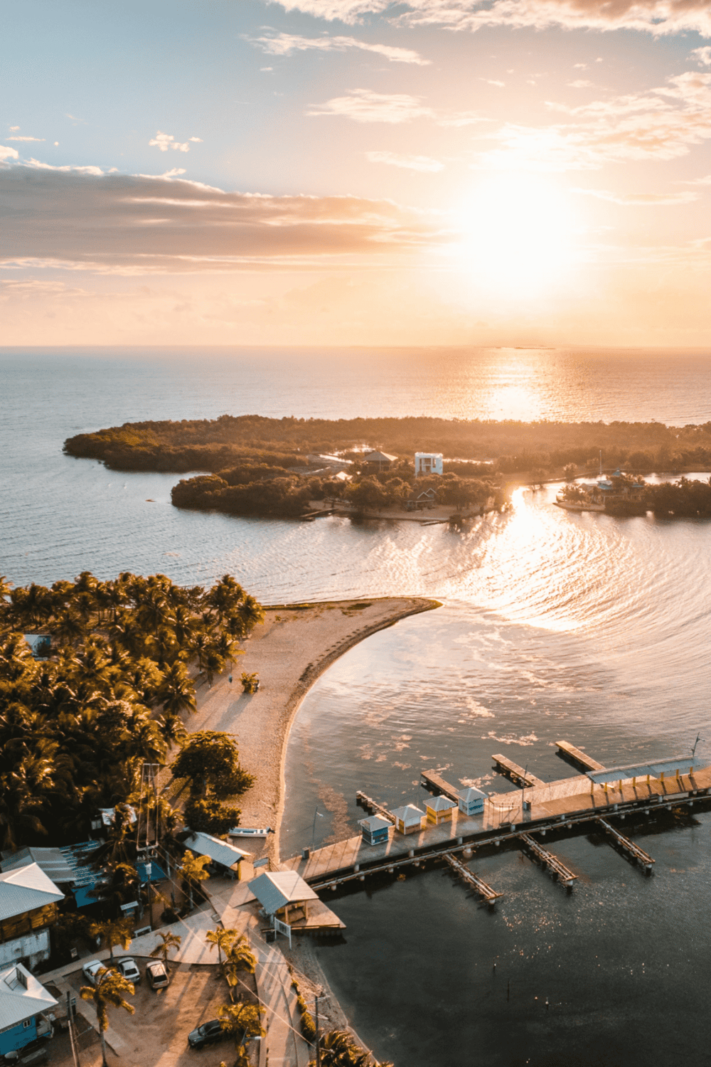 Seaside destination with marina, sunset views, and tropical landscape | QuestForDirections.