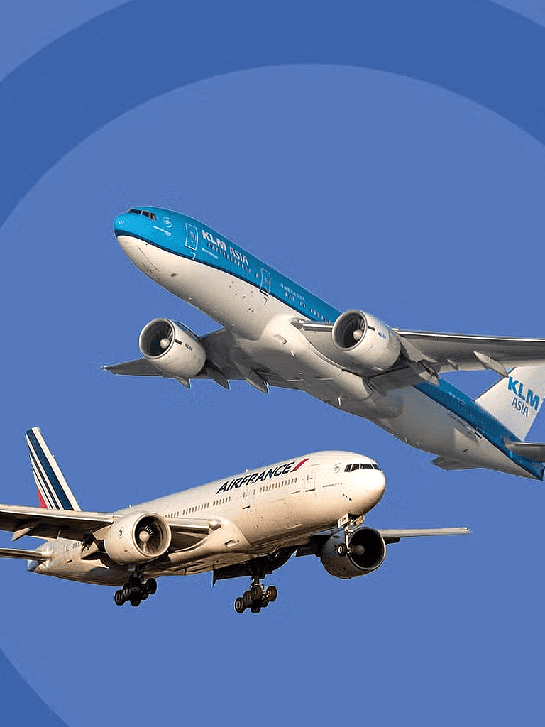B2B airline fleet with KLM Asia and Air France jets in flight against a blue sky.