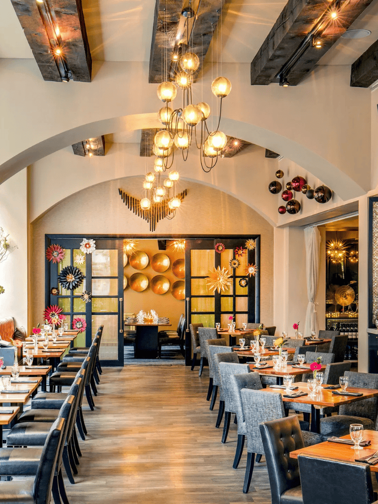 Elegant restaurant interior with modern lighting and stylish decor for memorable dining experiences.