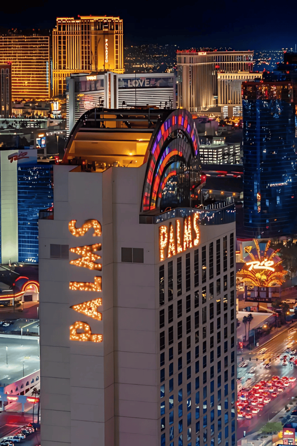 Vibrant Las Vegas skyline at night featuring the iconic Paris Hotel & Casino with illuminated signs and colorful lights.