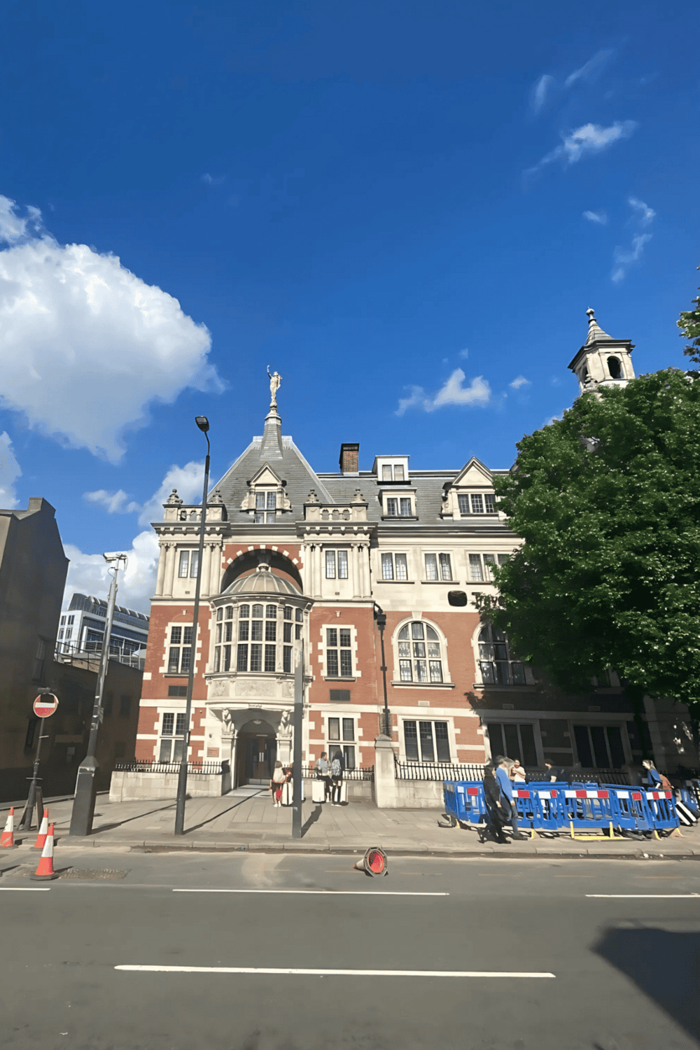 Dreamy European-style building with historic architecture under blue sky.