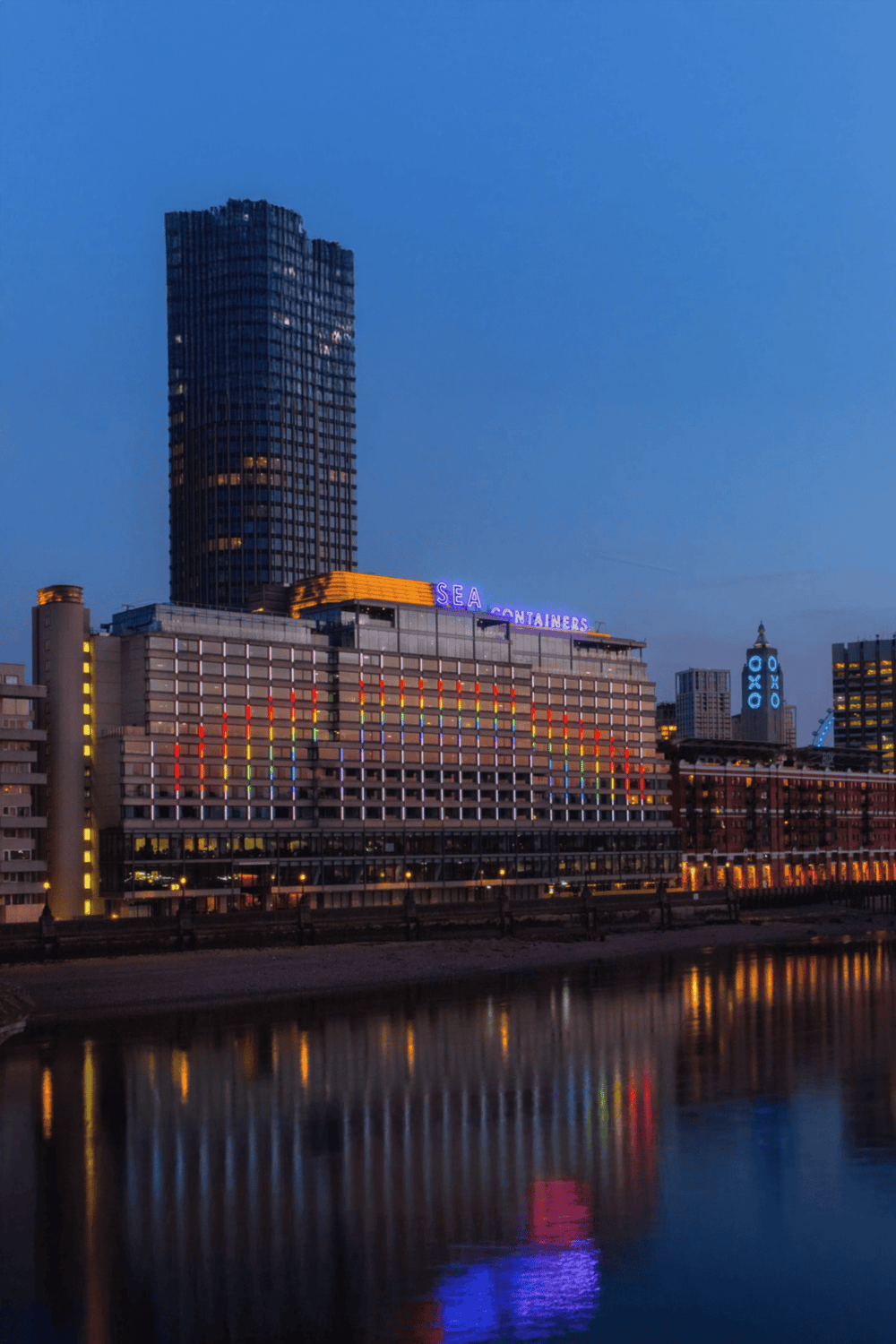 City skyline with modern buildings and vibrant night lights, showcasing urban exploration and city nightlife.