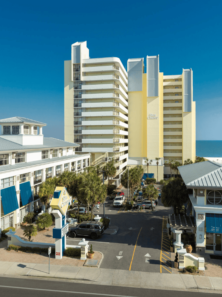 Beachfront hotel with ocean views, modern architecture, and amenities at Quest For Directions.