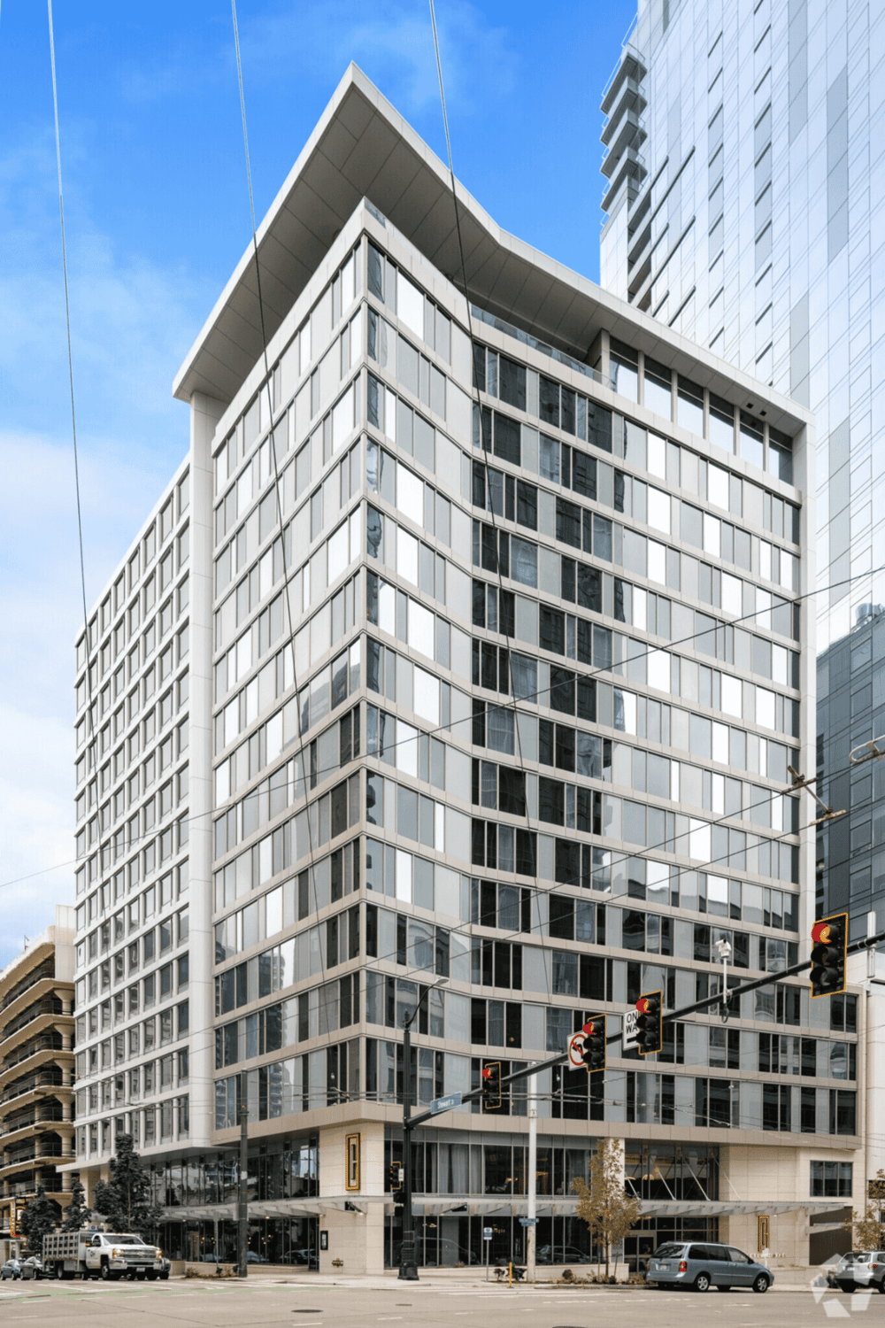 Modern office building with glass facade skyline view in downtown.