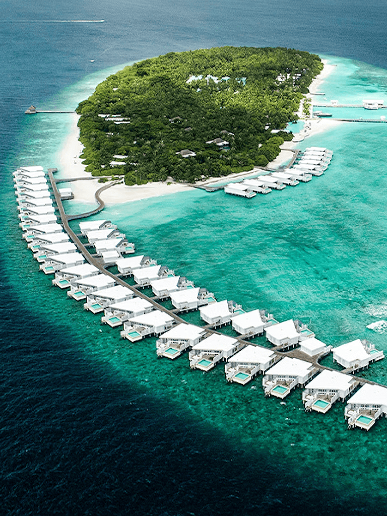 Luxurious overwater villas at a tropical island resort, perfect for an unforgettable getaway.