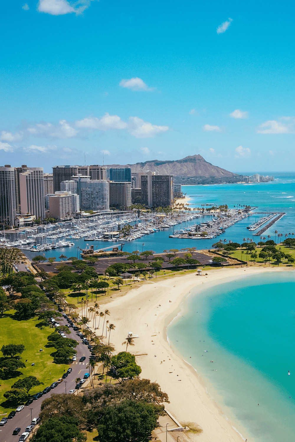 Beachfront vacation in Honolulu with downtown skyline, marina, and scenic mountain views.