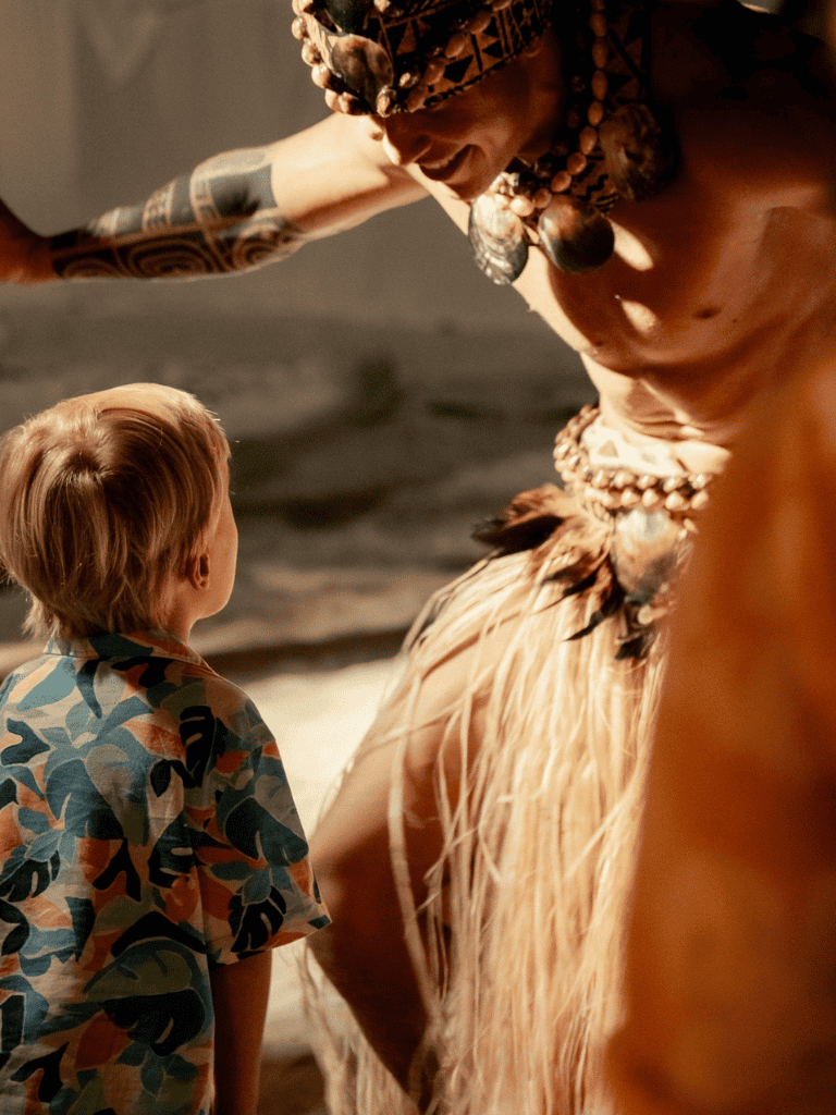 Traditional Polynesian dancer performing at cultural event in Polynesia.