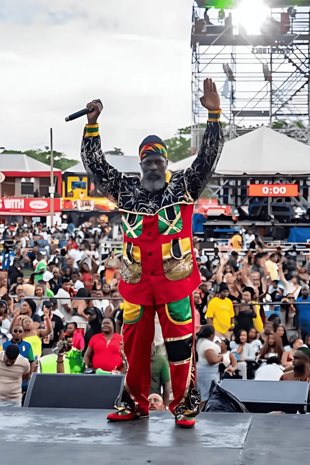1. Vibrant performer in colorful African attire at an outdoor cultural event and music festival.