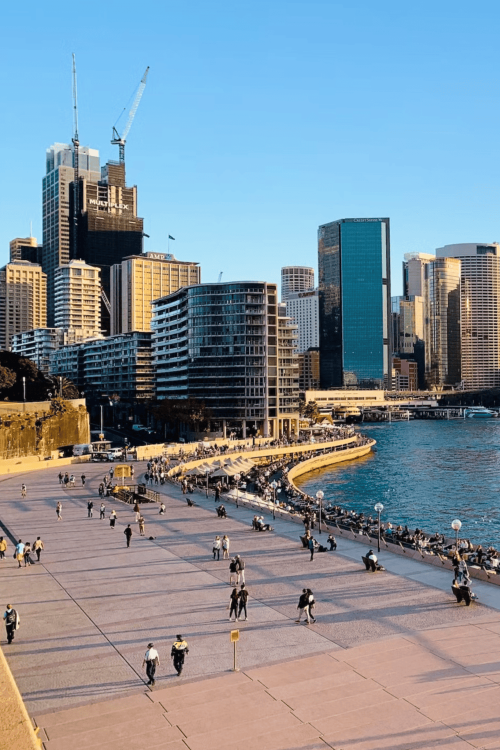 Modern city skyline with skyscrapers and waterfront view | QuestForDirections.