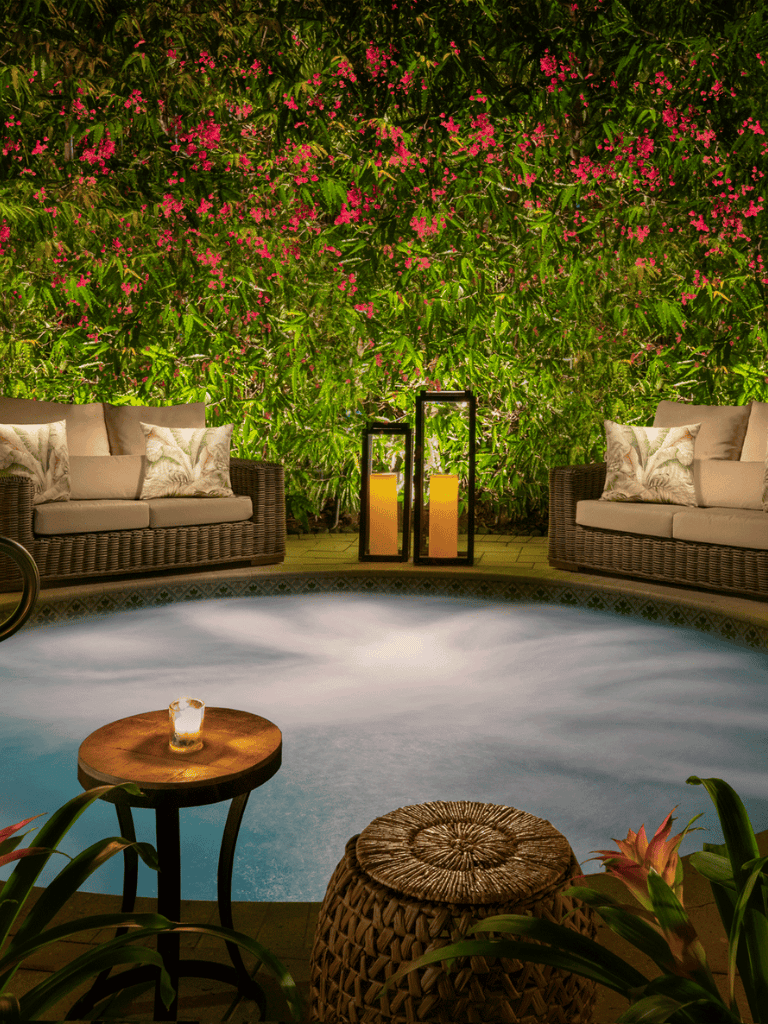Relaxing backyard patio with cozy sofas and ambient lighting at QuestForDirections.