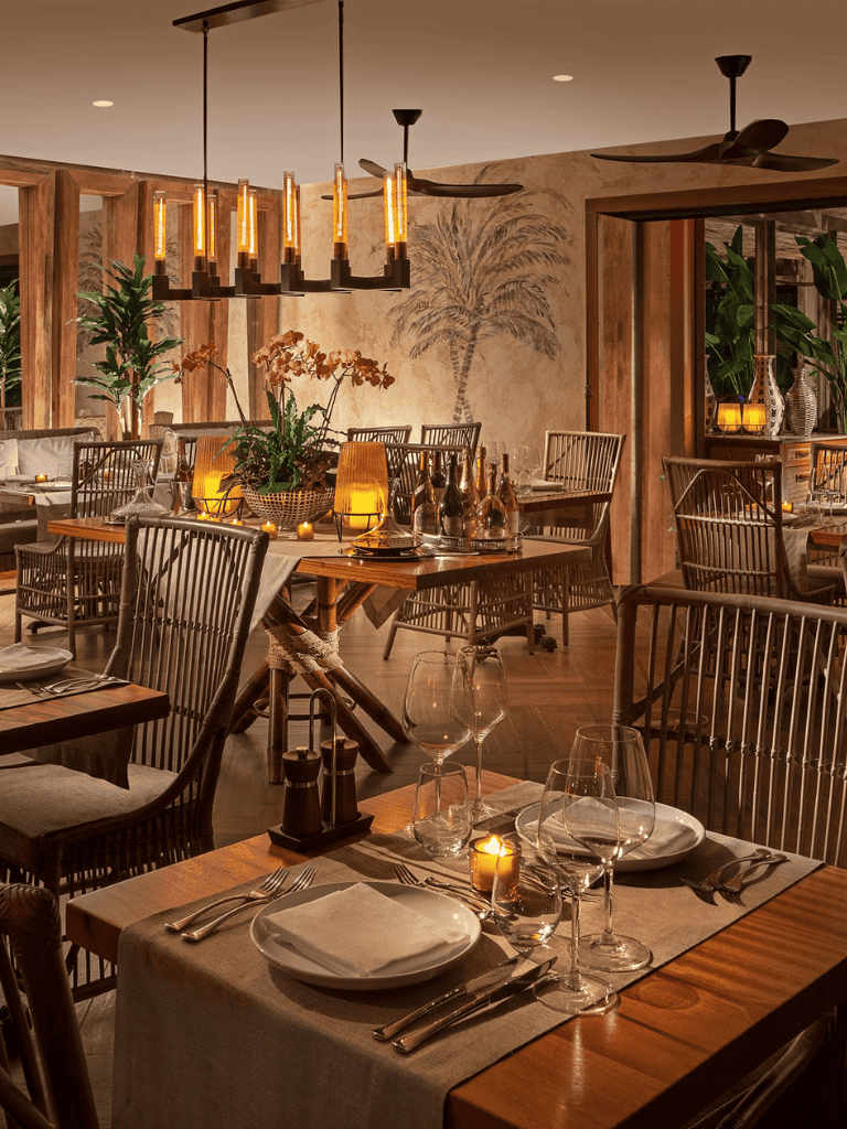 Elegant restaurant interior with warm lighting and stylish decor, perfect for fine dining experiences.