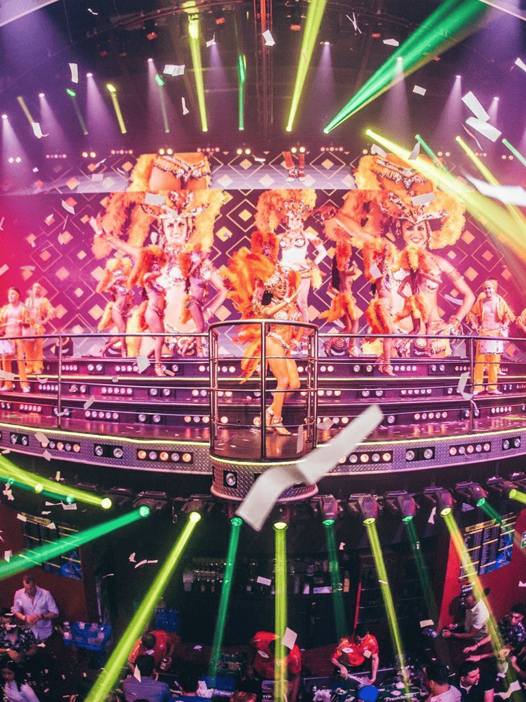 Vibrant carnival dance performance with colorful costumes and lively stage lighting.