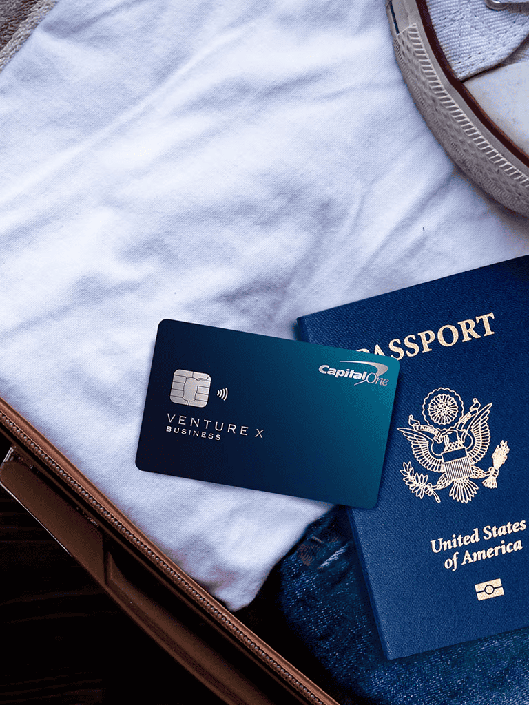 Credit card, passport, and travel essentials for international trip preparation.