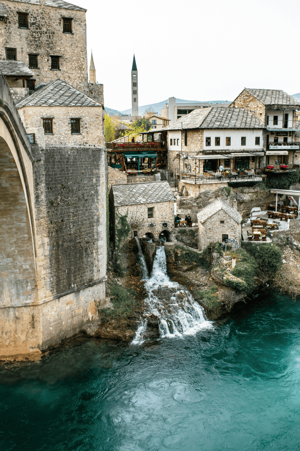 Charming historic village with stone buildings and waterfalls in Mostar, Bosnia and Herzegovina.
