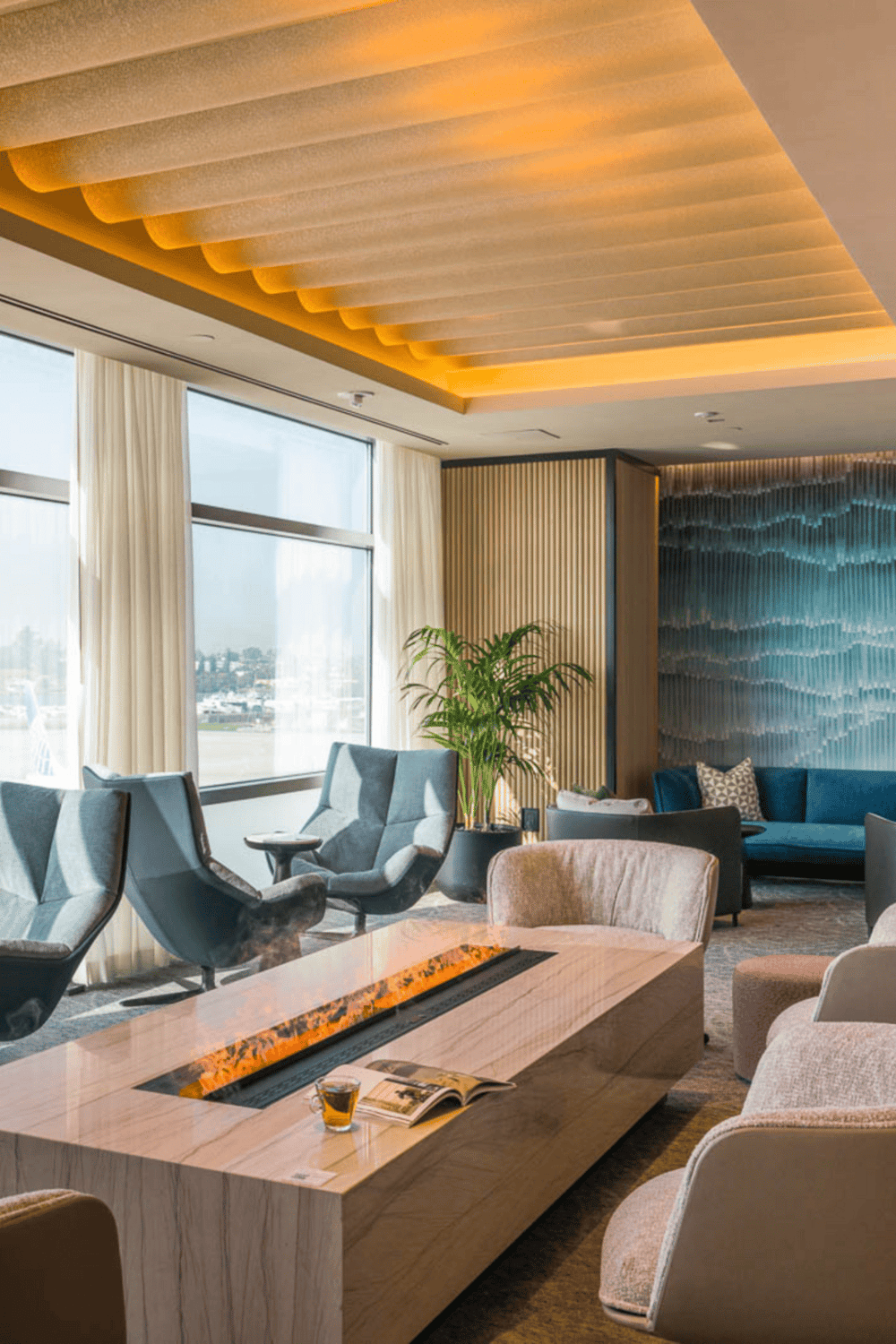 Modern hotel lounge with comfortable seating and ambient lighting for relaxation and guest comfort.